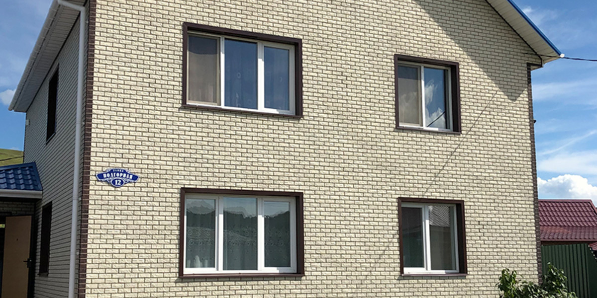 Современный коттедж из газобетона с облицовкой