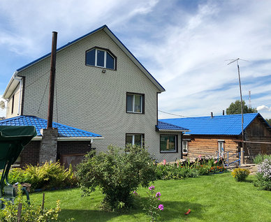 Современный коттедж из газобетона с облицовкой